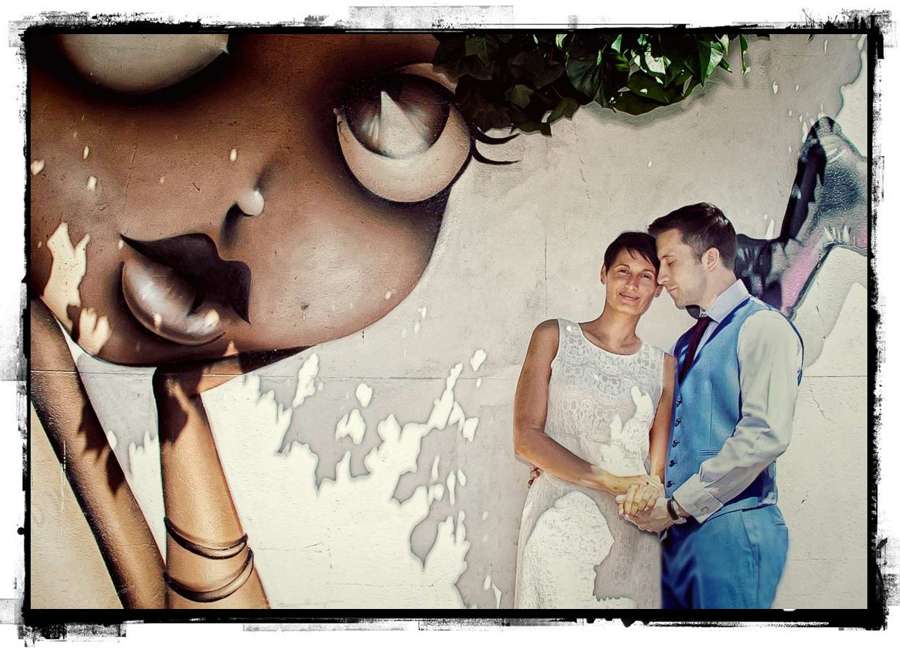 East end wedding couple by graffiti