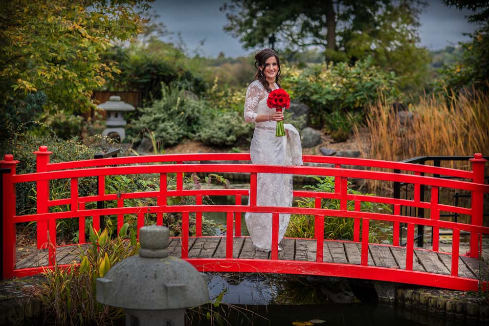Red bridge shot at Sopwell House wedding