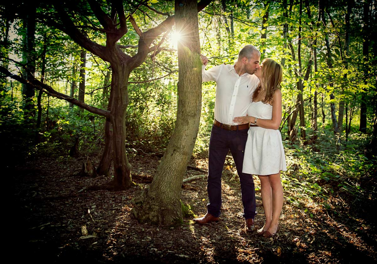 wedding couple kissing in London forest