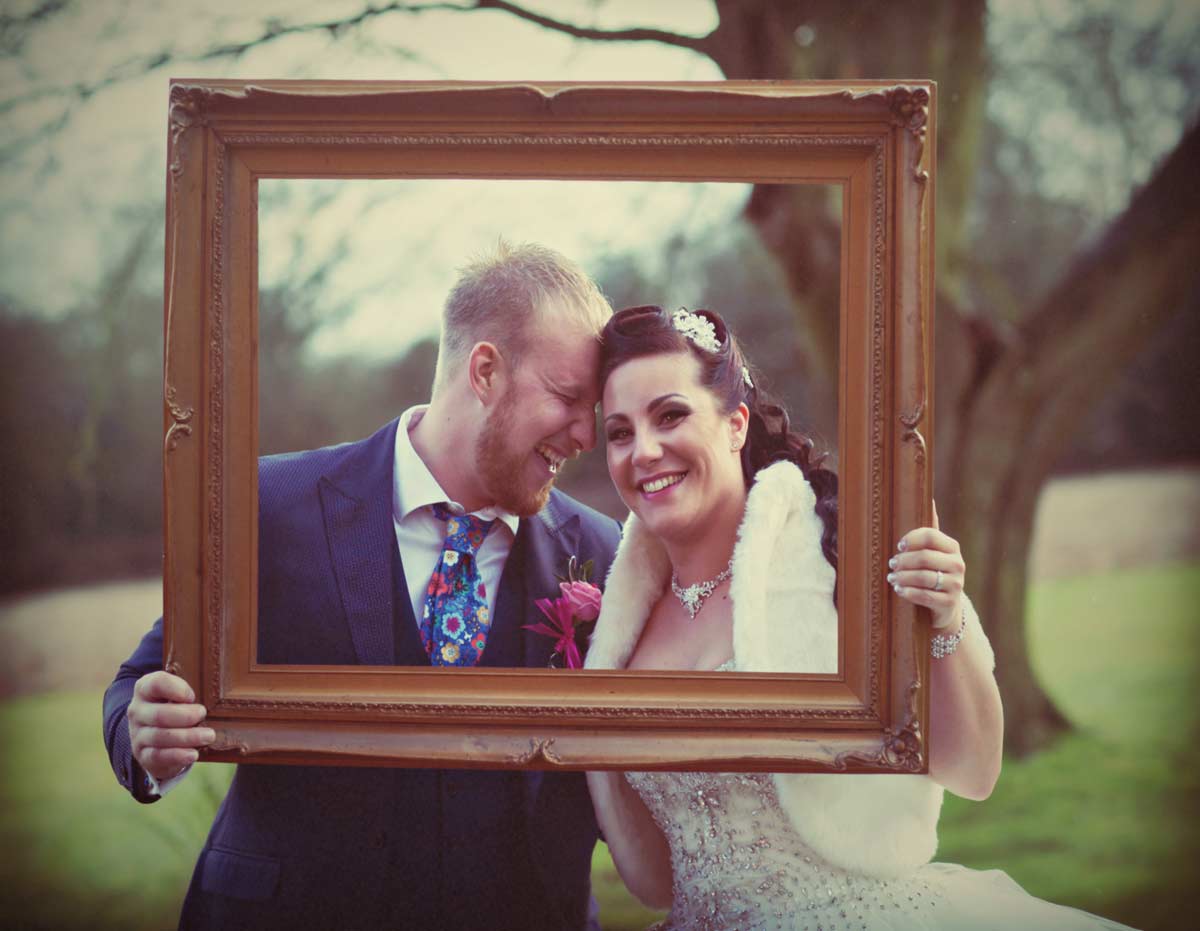 London wedding couple in a frame