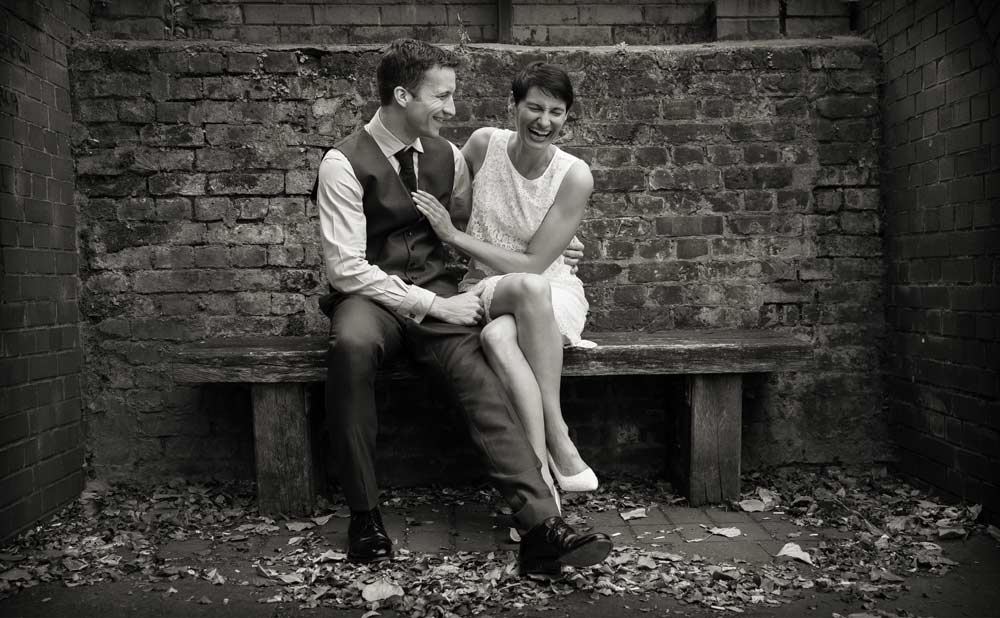 wedding couple on Aldgate bench 1