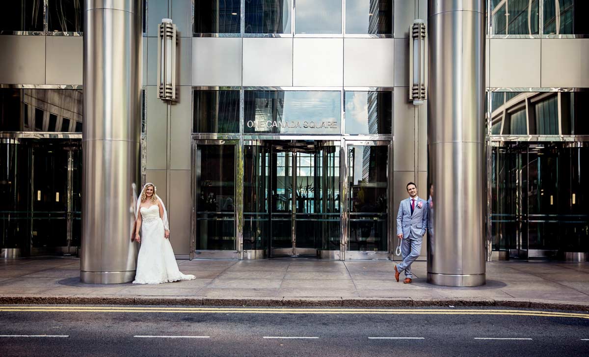 wedding couple pose at Canada square Canary Wharf