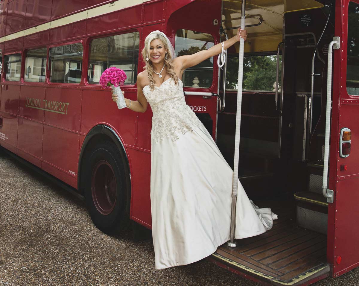 bride leaning out of Routemaster bus