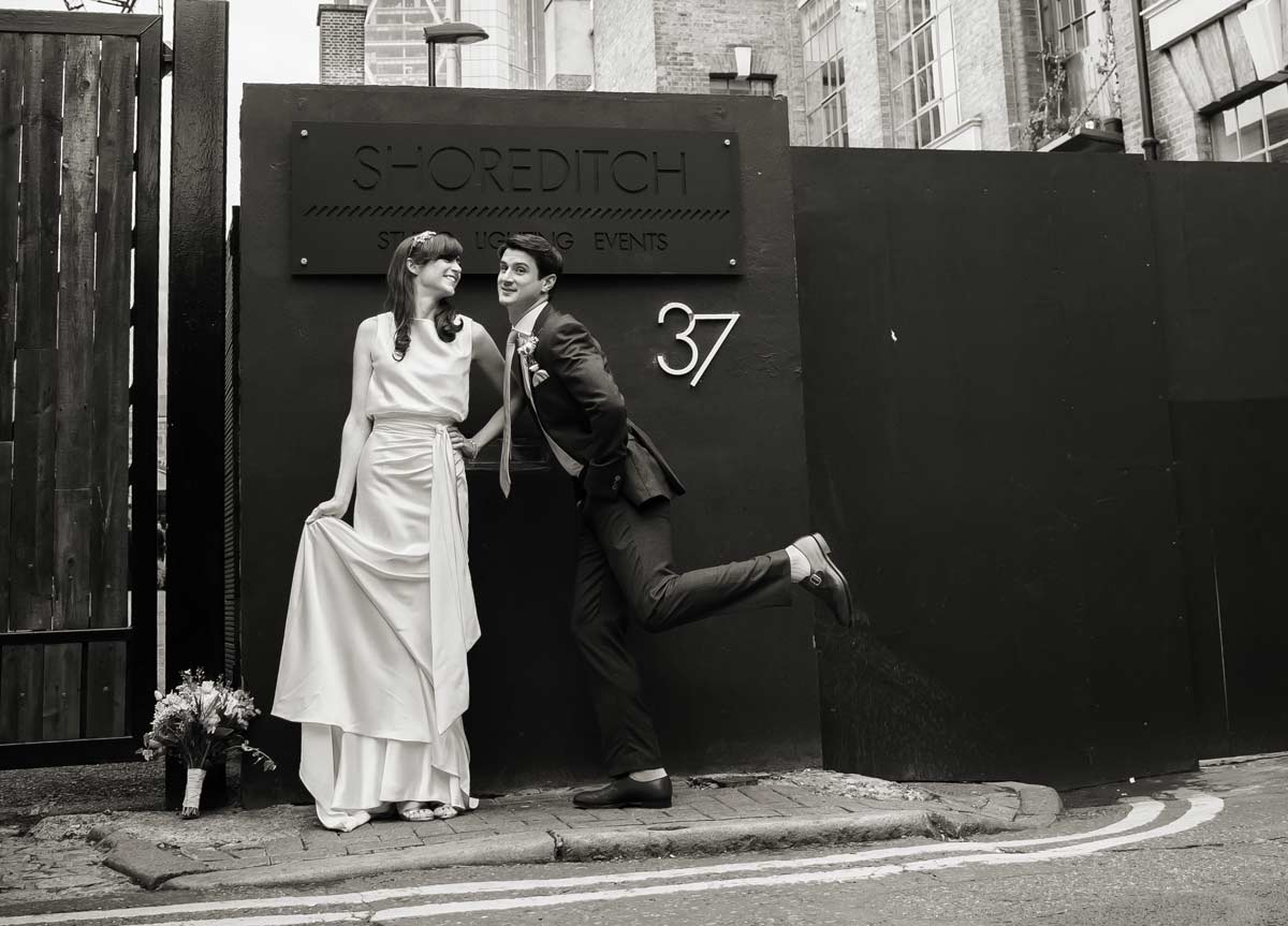 wedding couple shot messing around Shoreditch studios