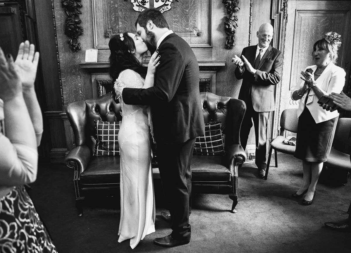 Final kiss at Islington wedding ceremony