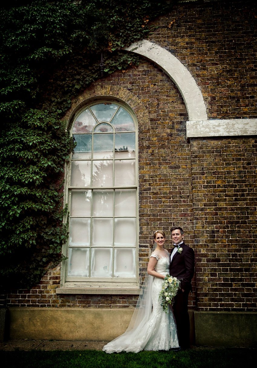 Bride and groom outside Hampton Court House