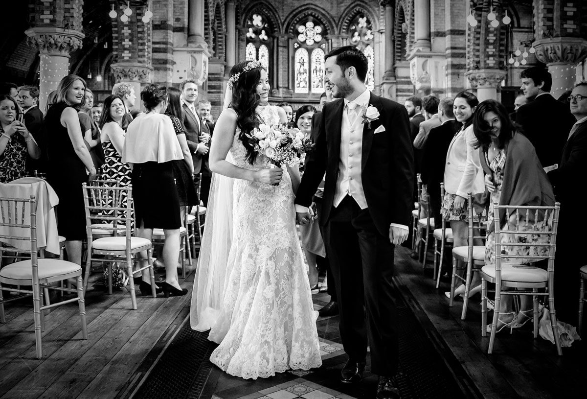 Bride and groom walk down the aisle at London Hampstead wedding