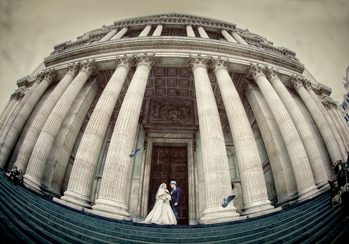 St Pauls Cathedral wedding photographer couple pose outside photo