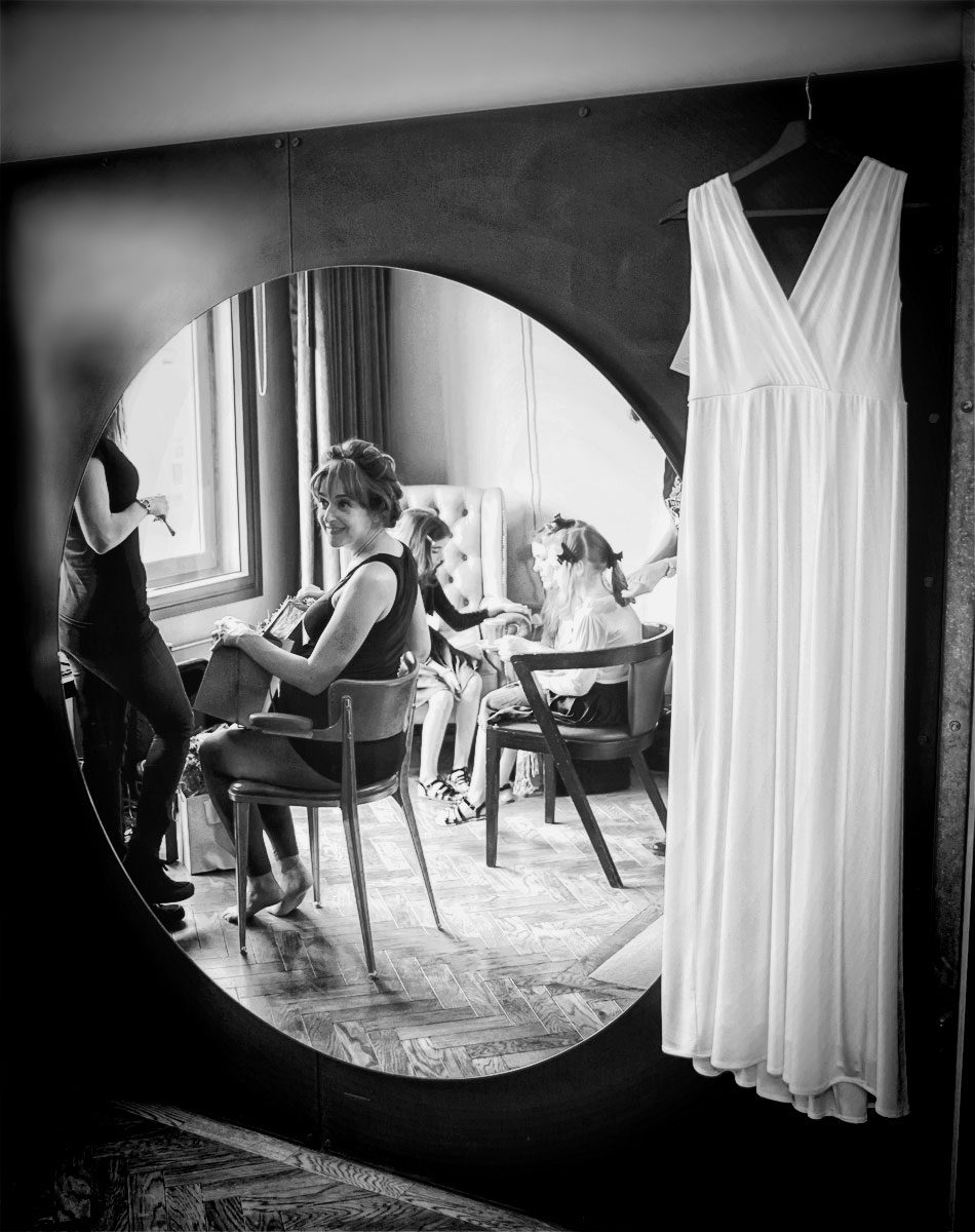 Bride in mirror at East London wedding hotel