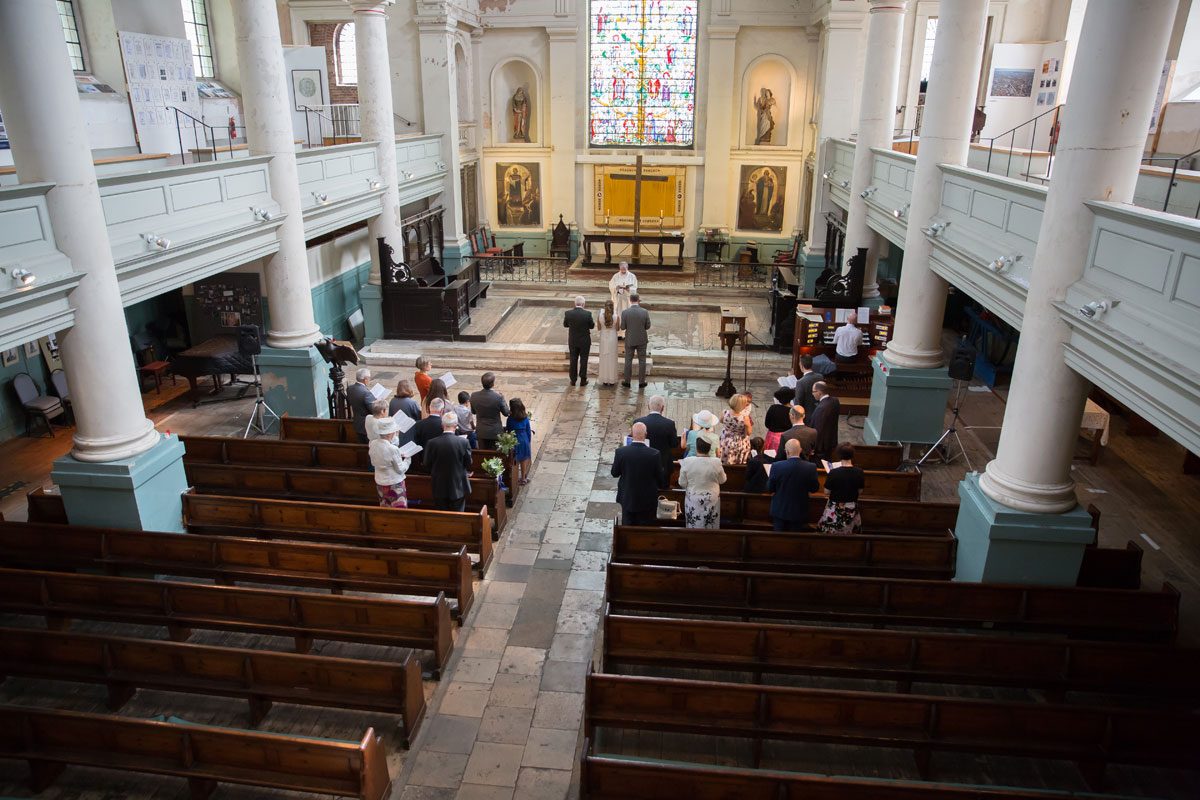 Wedding ceremony from balcony at St Leonards Shorditch