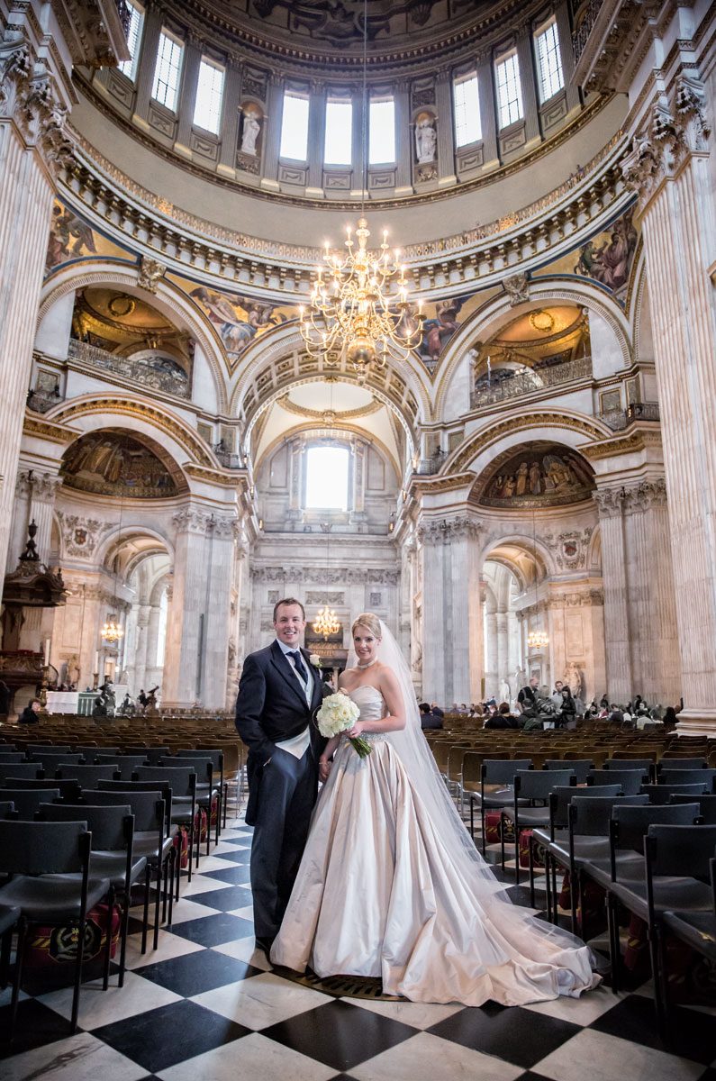 Wedding-couple-pose-after-ceremony-at-St-Pauls-Cathedral-wedding