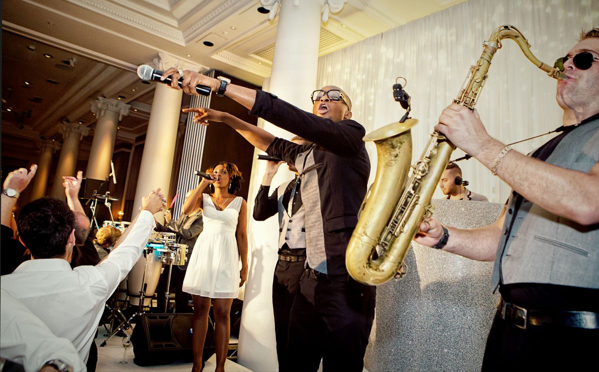 Band plays at wedding reception Waldorf Hilton London