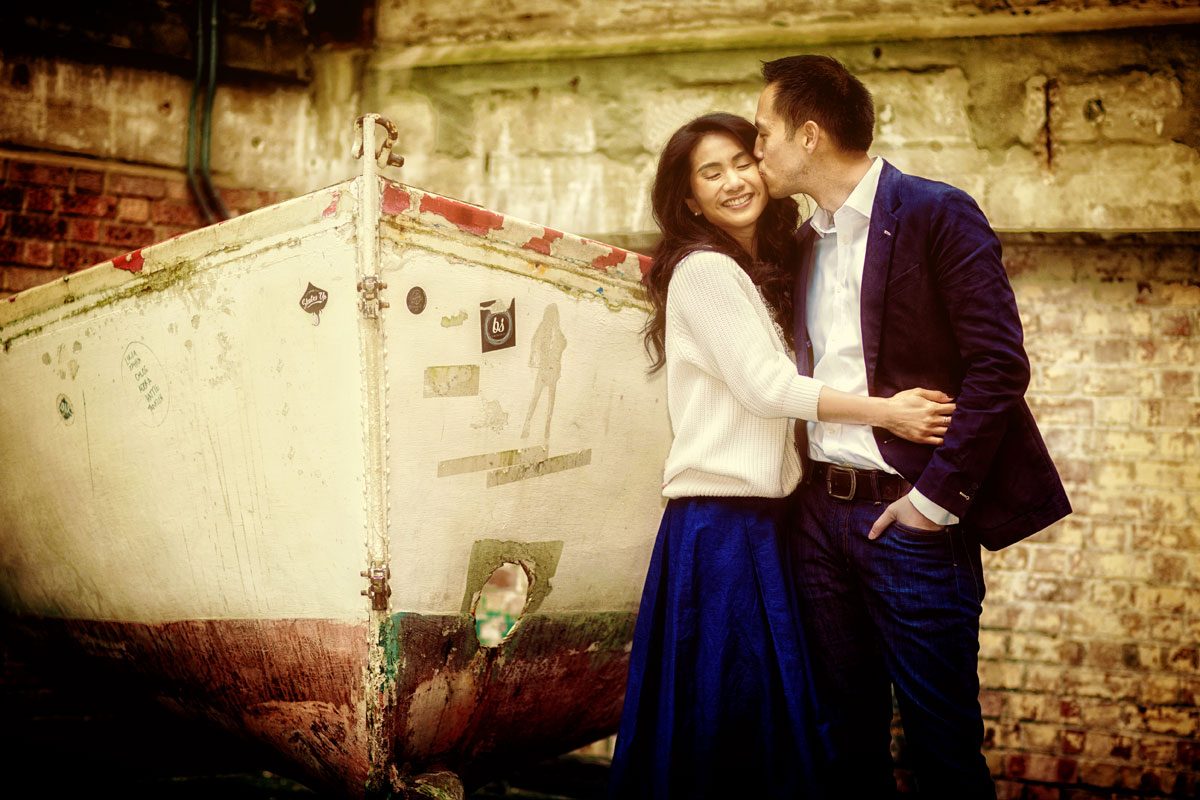 Engagement couple by boat in London Southbank