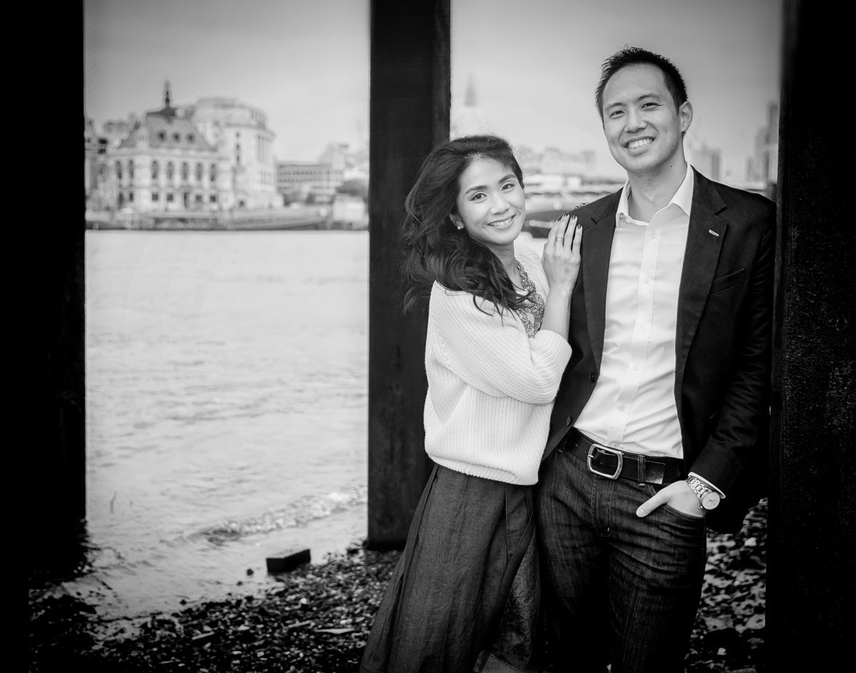 Engagement couple on beach by Oxo Tower at London Southbank photo
