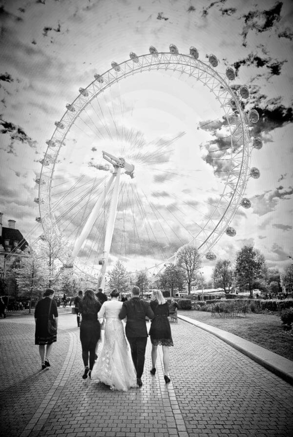 Bride and groom walking to their London Eye Wedding ceremony