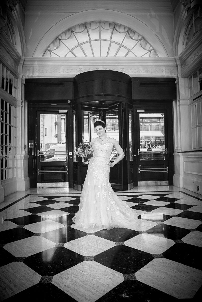 Bride in reception at Le Meridien Hotel London wedding