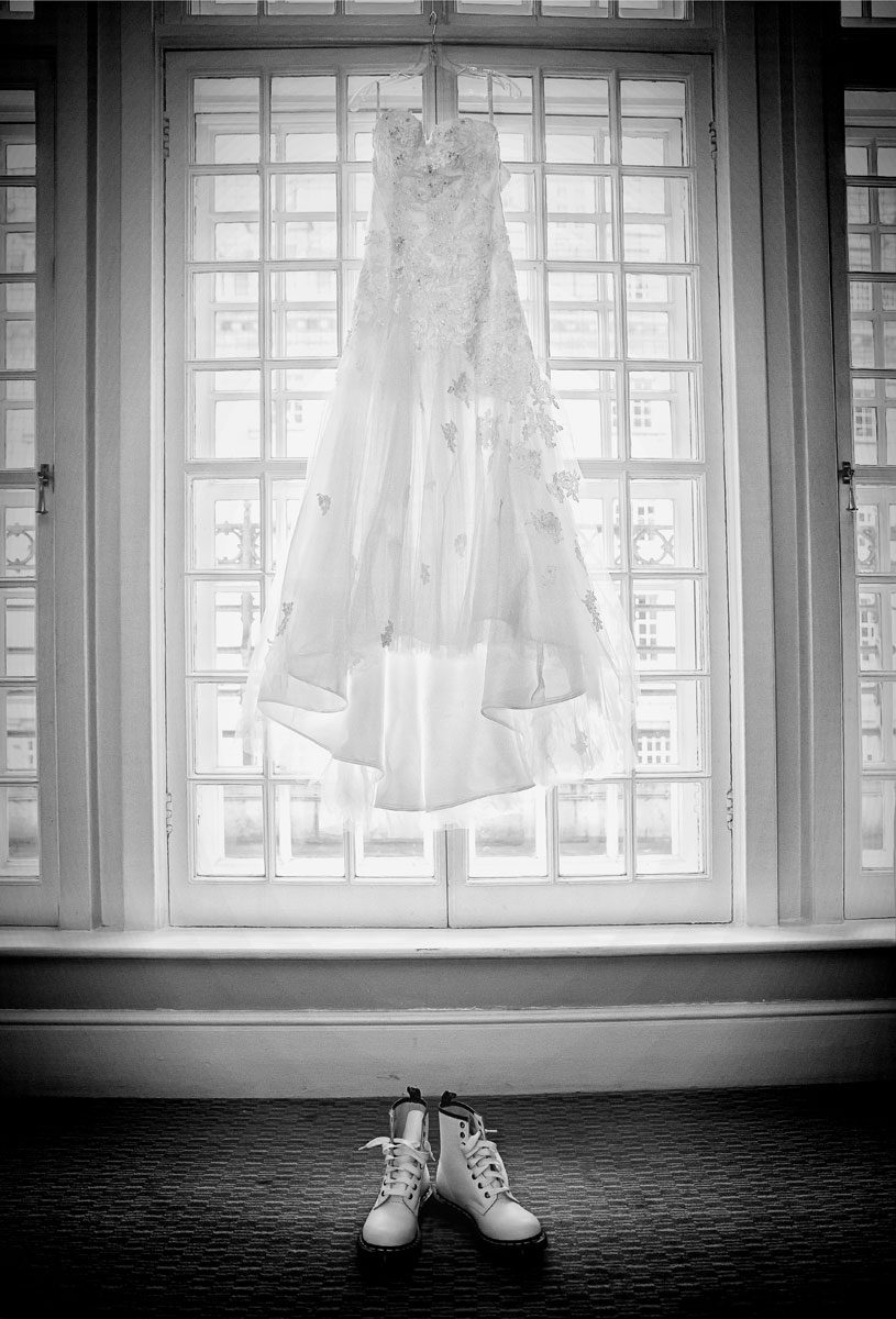 Wedding dress and shoes hanging at Le Meridien Piccadilly London