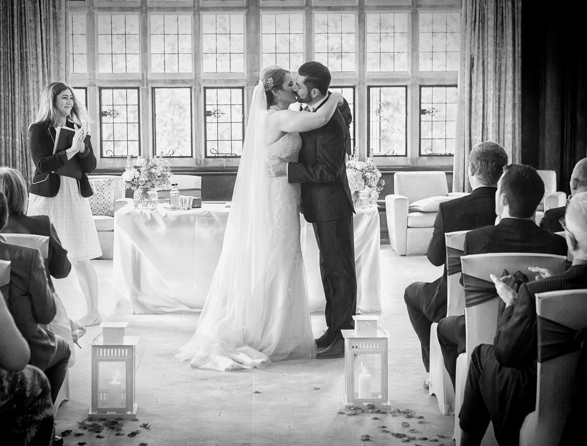 Wedding kiss at Fanhams Hall Ware Hertfordshire