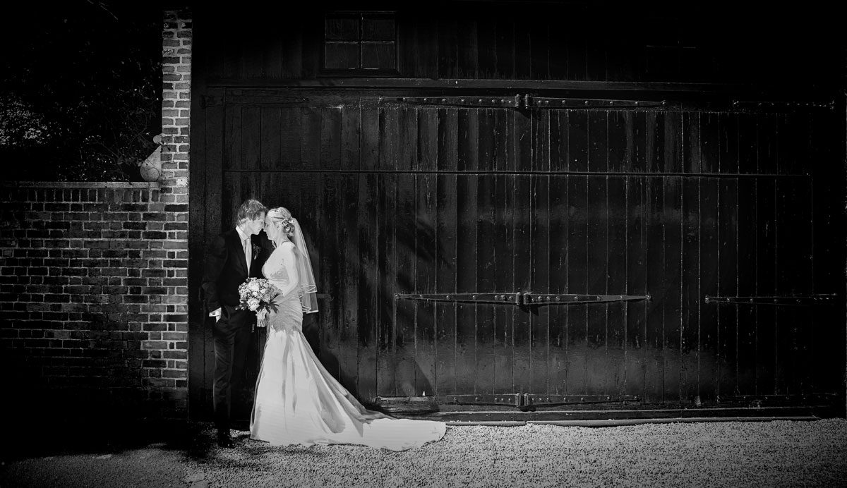 Barnet wedding couple in front of London stable doors