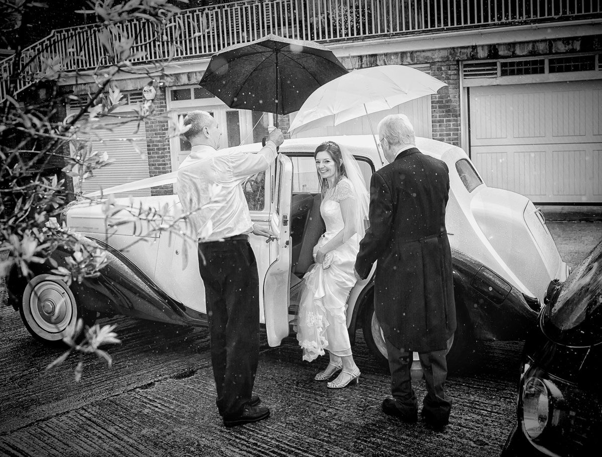 Bride leaves in rain for Lords Cricket Club wedding day