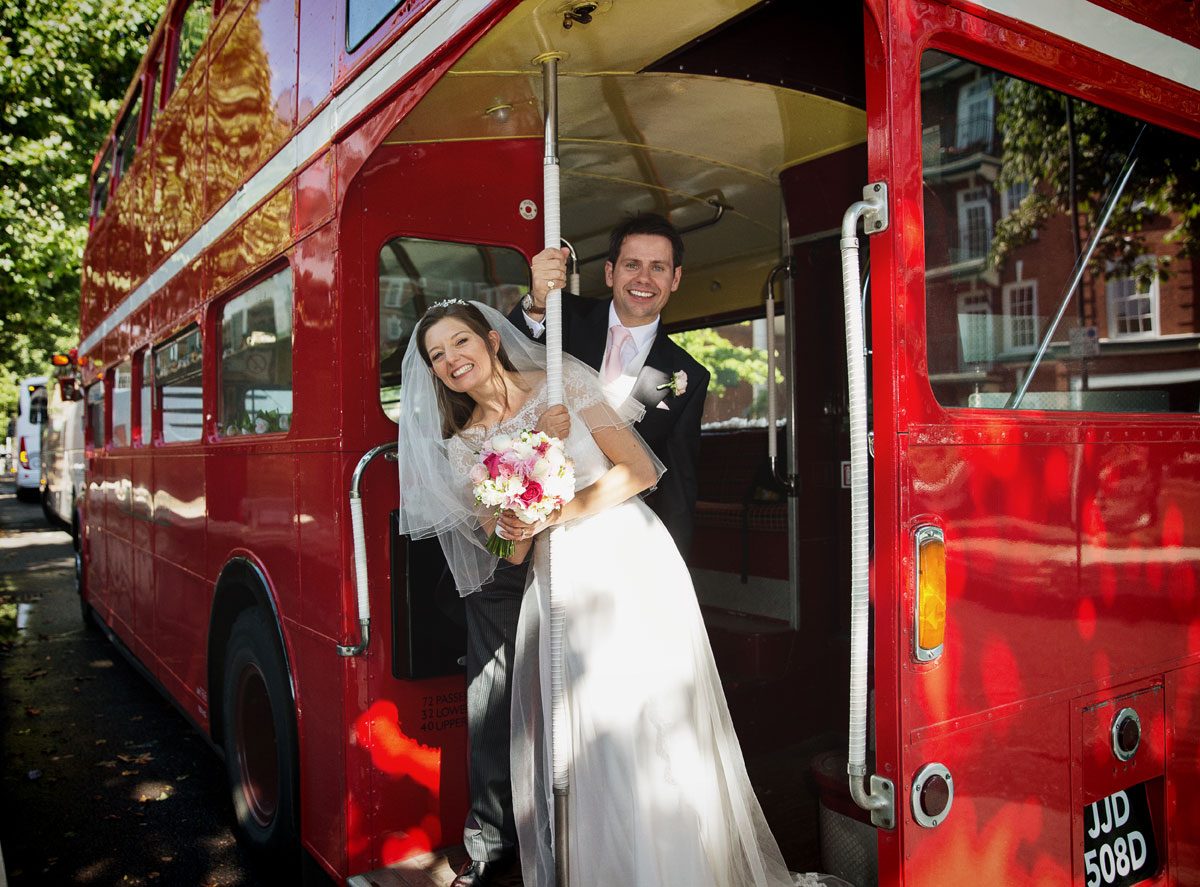 London wedding couple on routemaster bus at Lords Cricket Ground