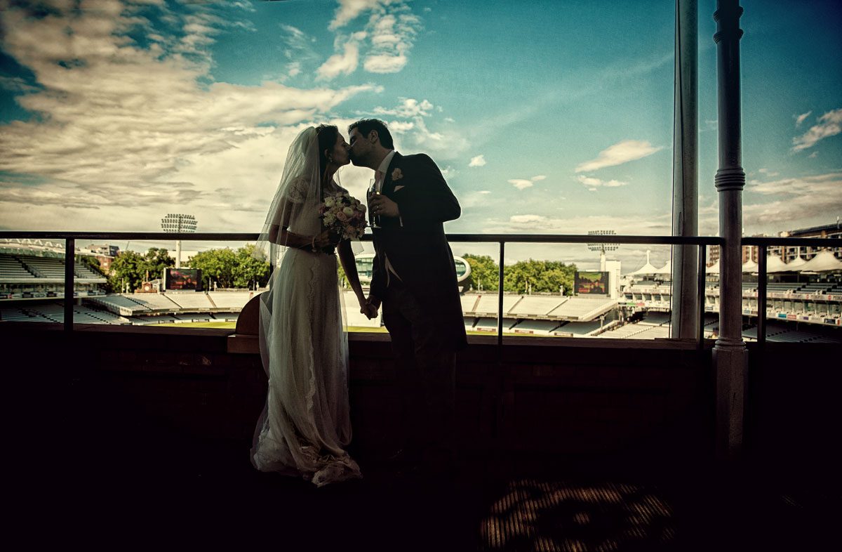 Silhouette of wedding couple kissing Lords Cricket Ground