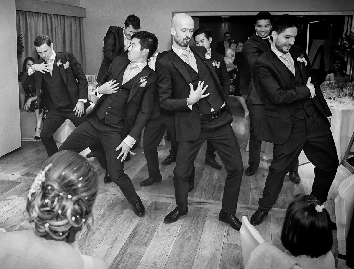 Groomsmen dance at Stokes Place Hotel wedding reception
