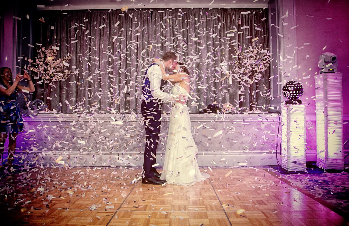 Confetti cannon explodes during Hambury Manor wedding first dance