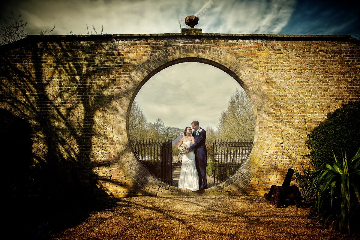 Hole in the wall wedding at Hanbury Manor