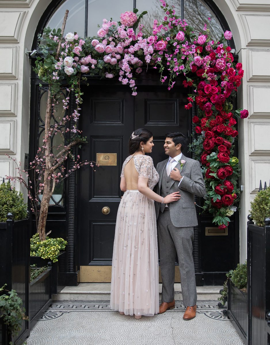 Wedding couple with flowers at Asia House central London