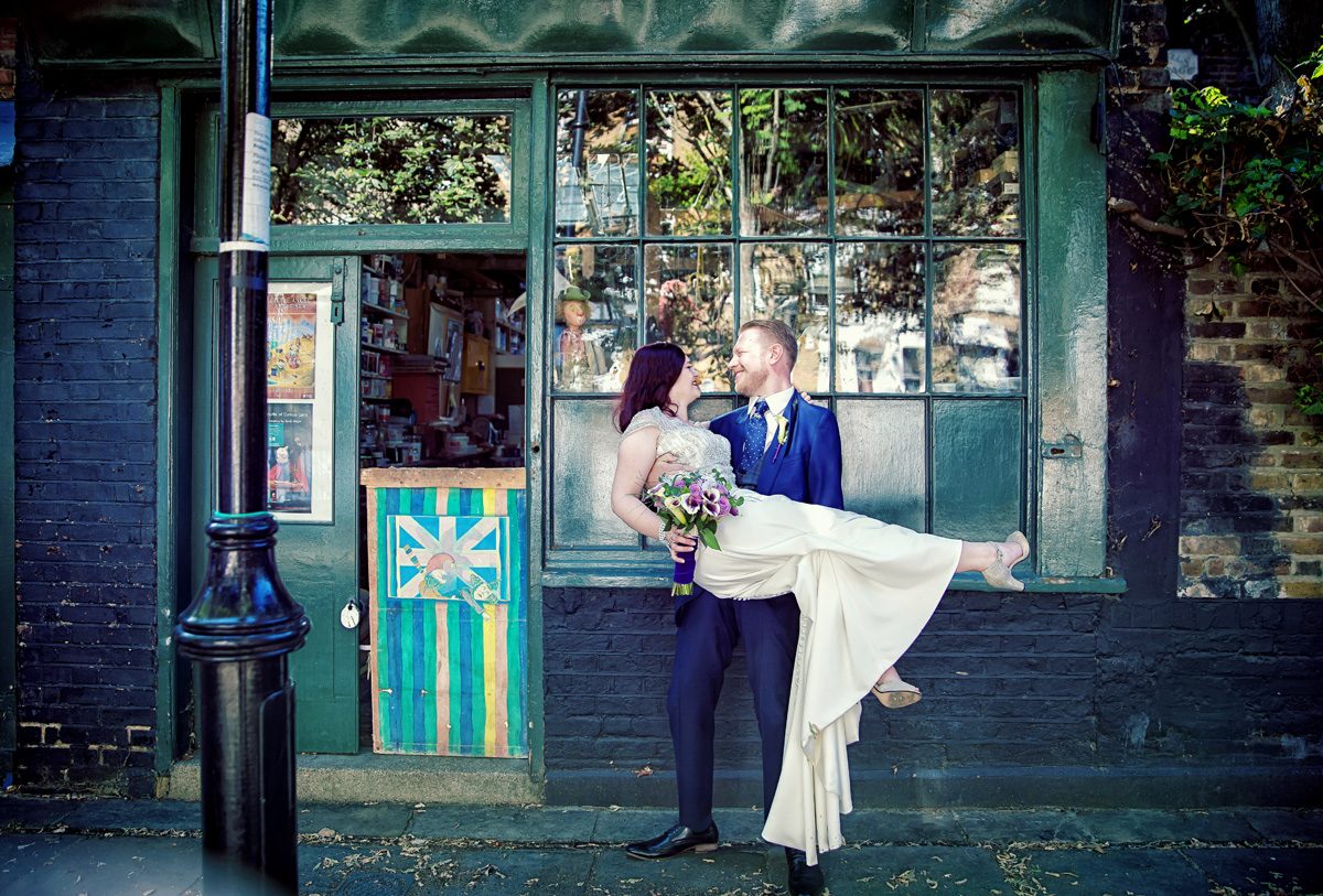 Islington Town Hall wedding couple outside a shop image