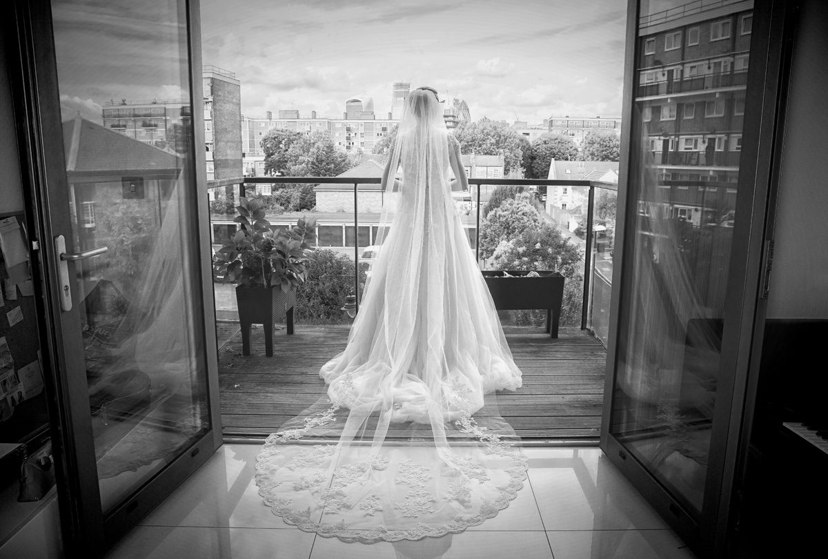Bride looks across London Gherkin wedding day