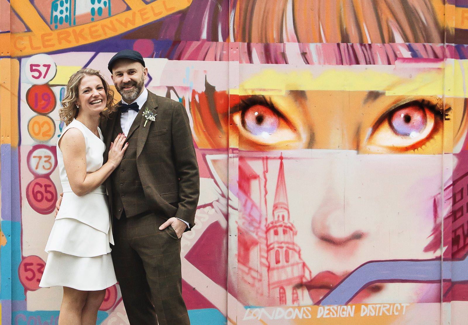 Clerkenwell wedding couple in eyes graffiti
