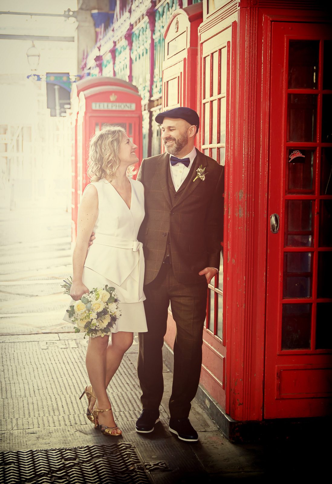 London Smithfield wedding day by phone boxes