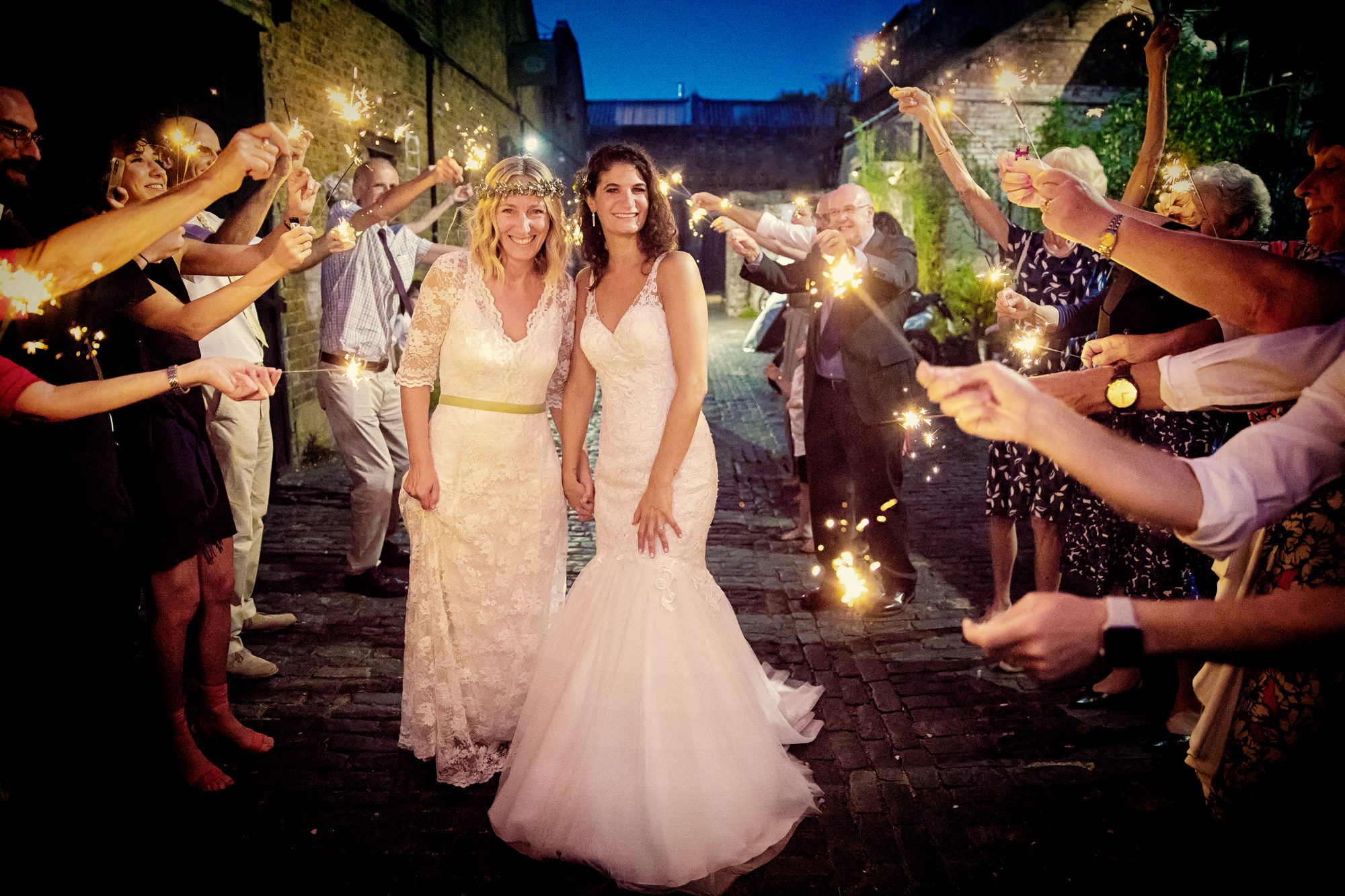 Two brides and sparklers at Clapton Country Club wedding