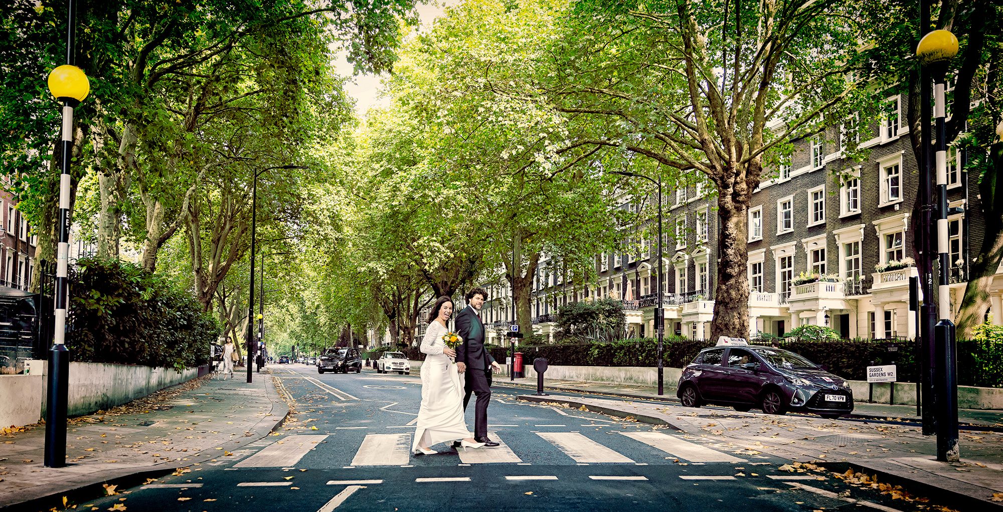 Bride and Groom at Abbey Road crossing wedding day