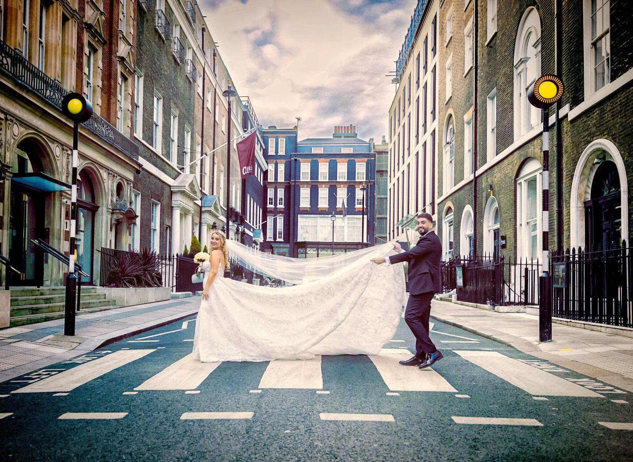 Bride and groom on crossing Mayfair wedding London