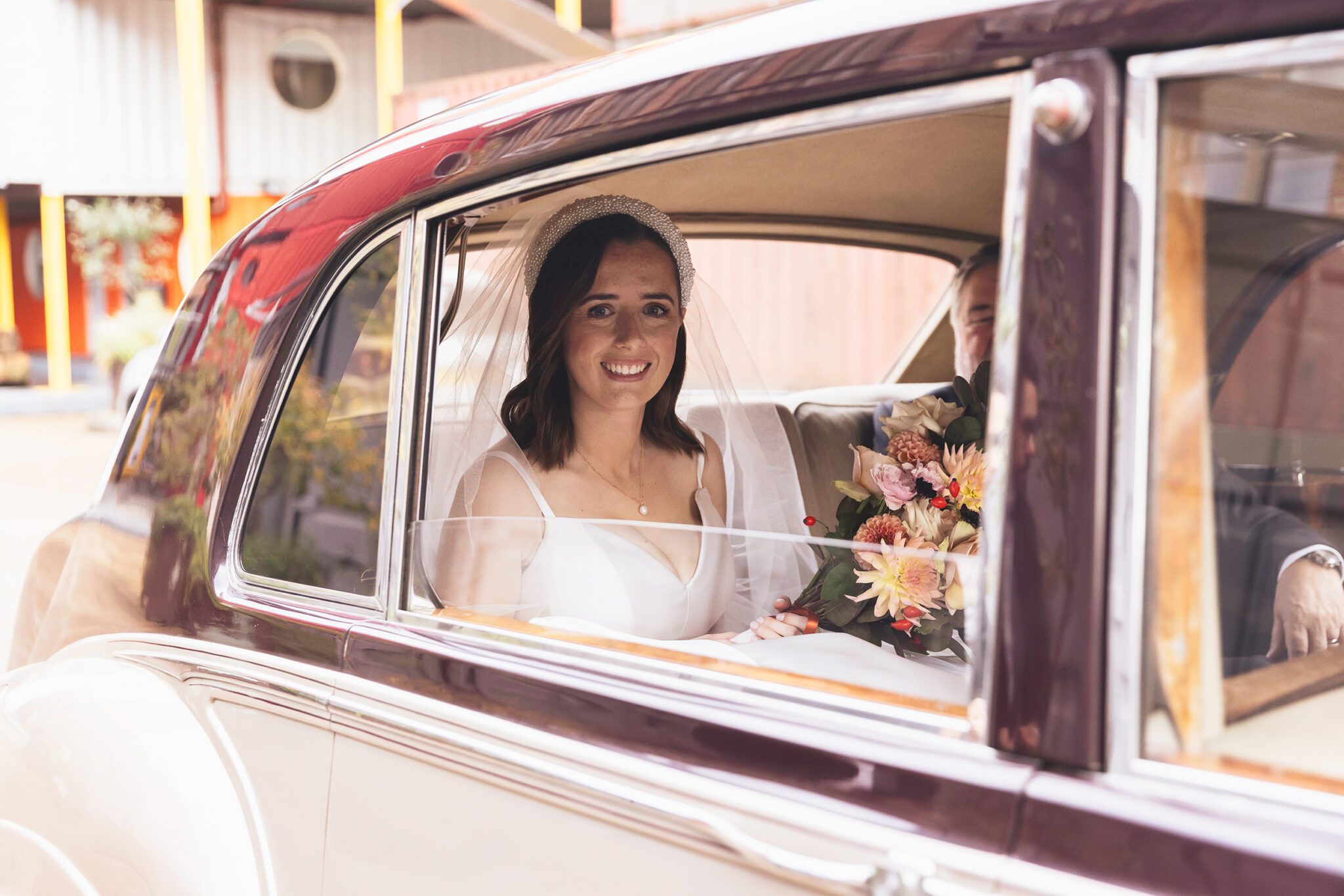 Bride arrives in car for Trinity Buoy Wharf Wedding