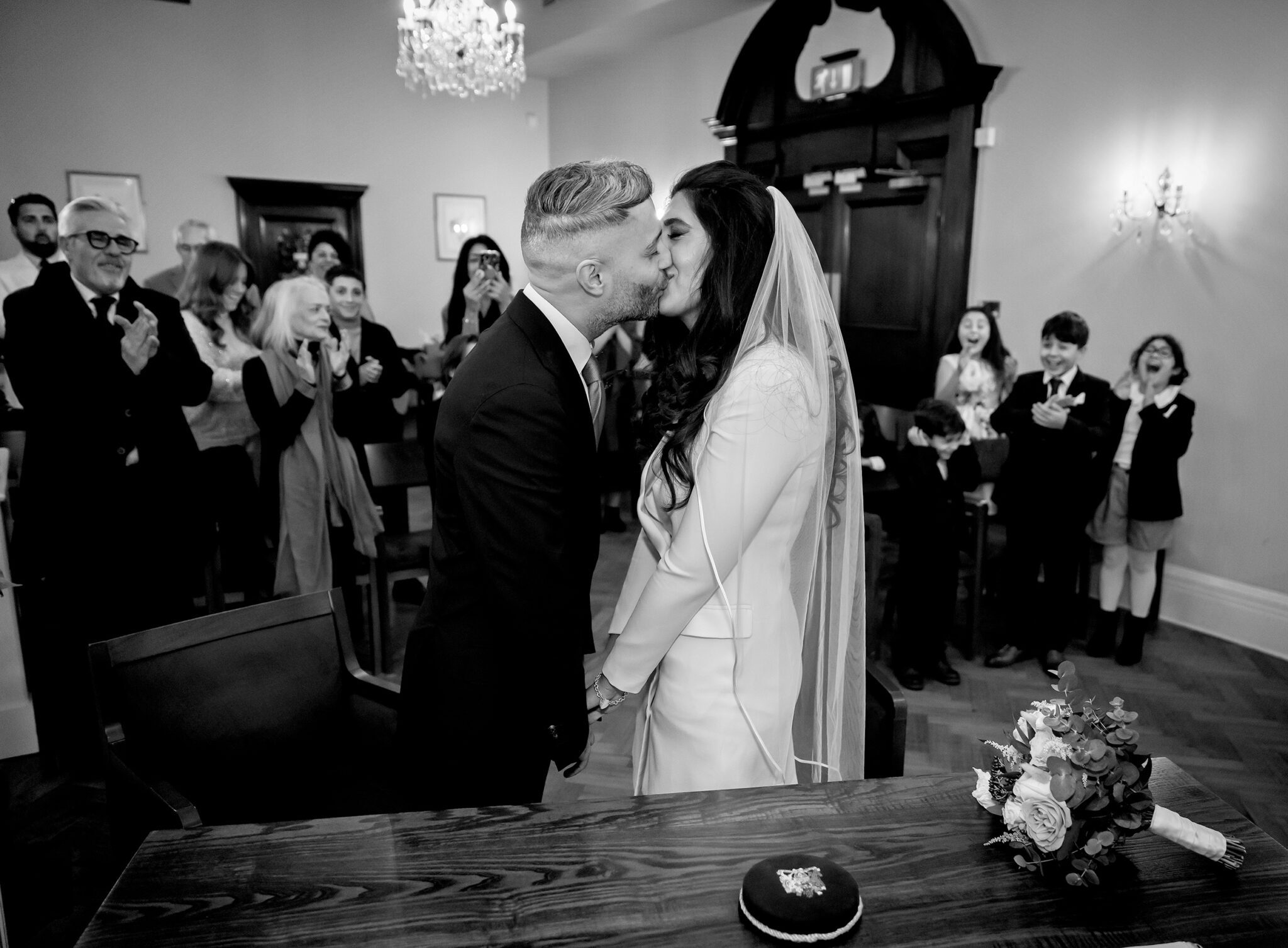 First kiss at Chelsea Old Town Hall wedding ceremony