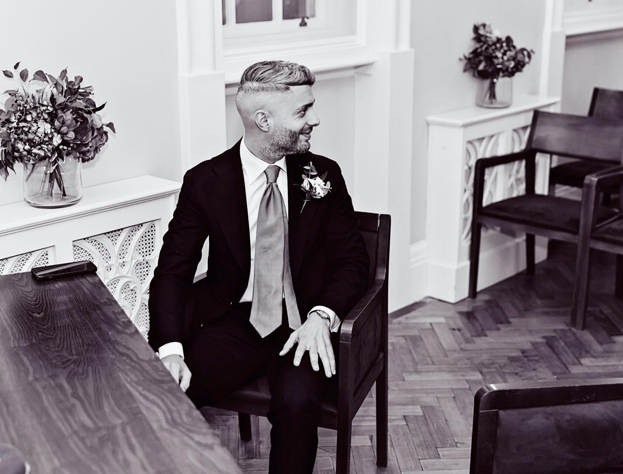 Groom waits at Chelsea Old Town Hall wedding ceremony