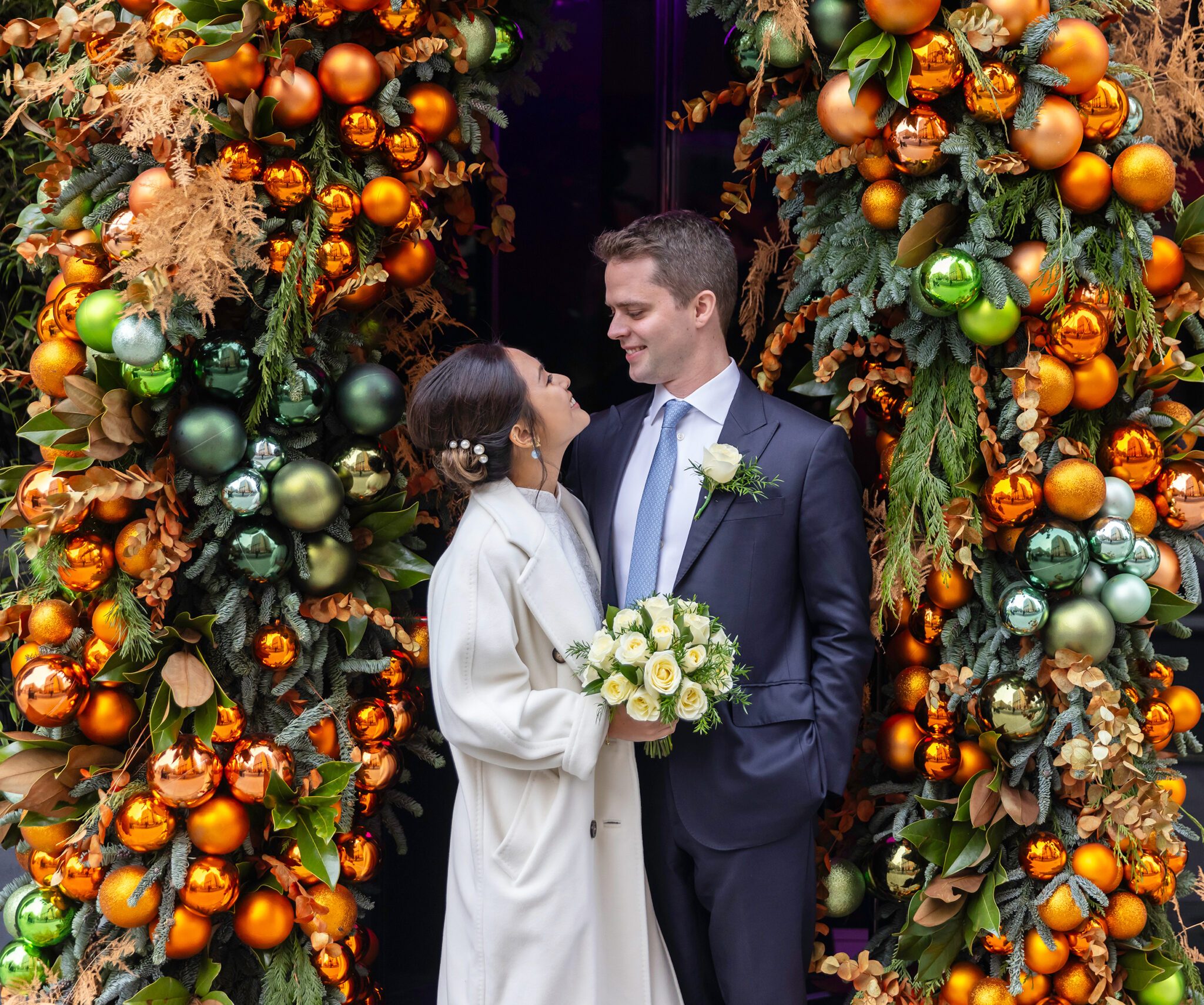 Old Marylebone Town Hall Wedding Couple in Christmas decorations image